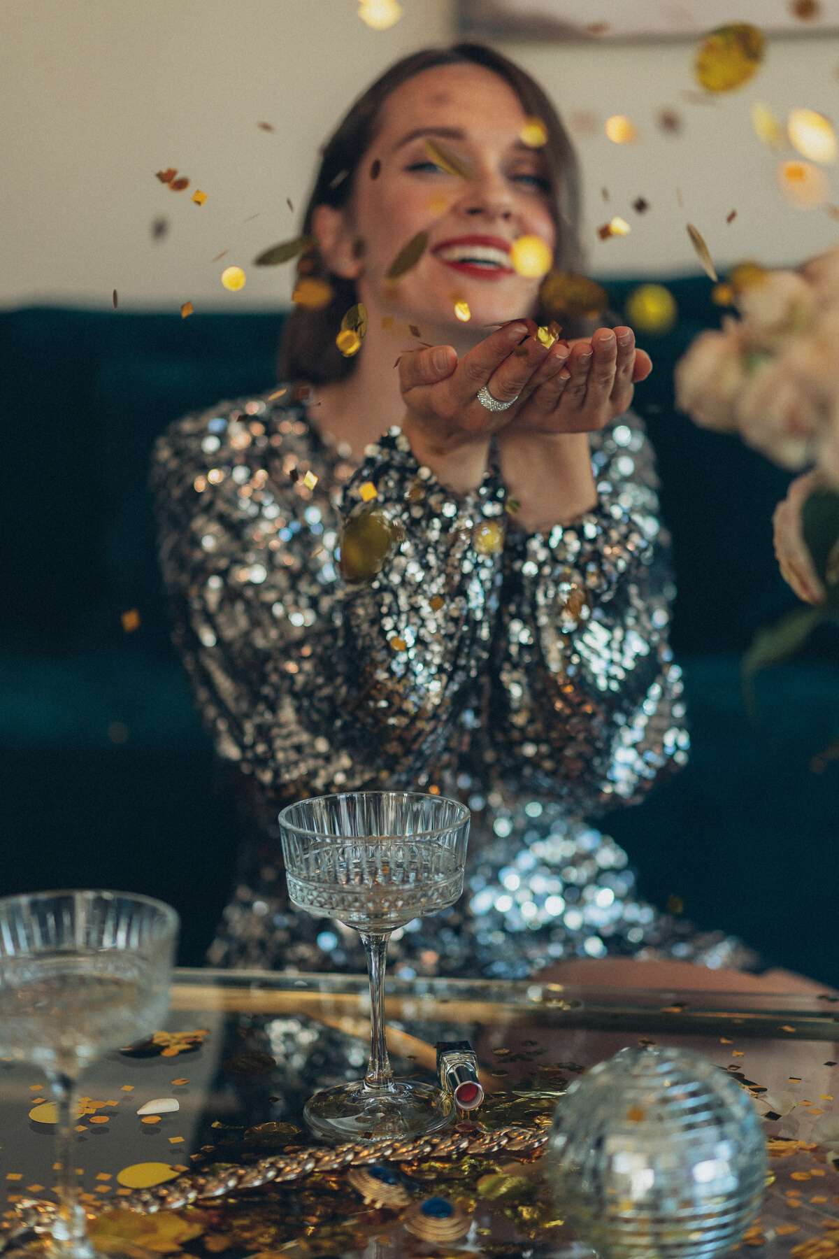 Woman in Silver Sequin Dress at a Party